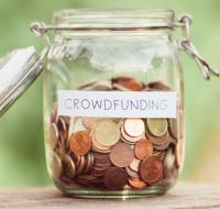 Money jar labelled Crowdfunding